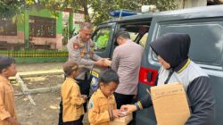 Polres Nganjuk Bagikan Makan Siang Bergizi Gratis di SDN 3 Berbek